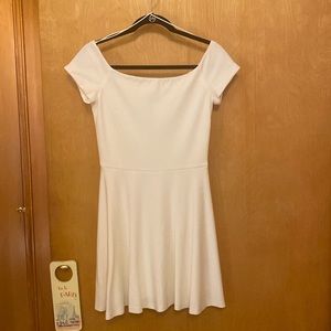 Portrait neckline fit and flair dress.